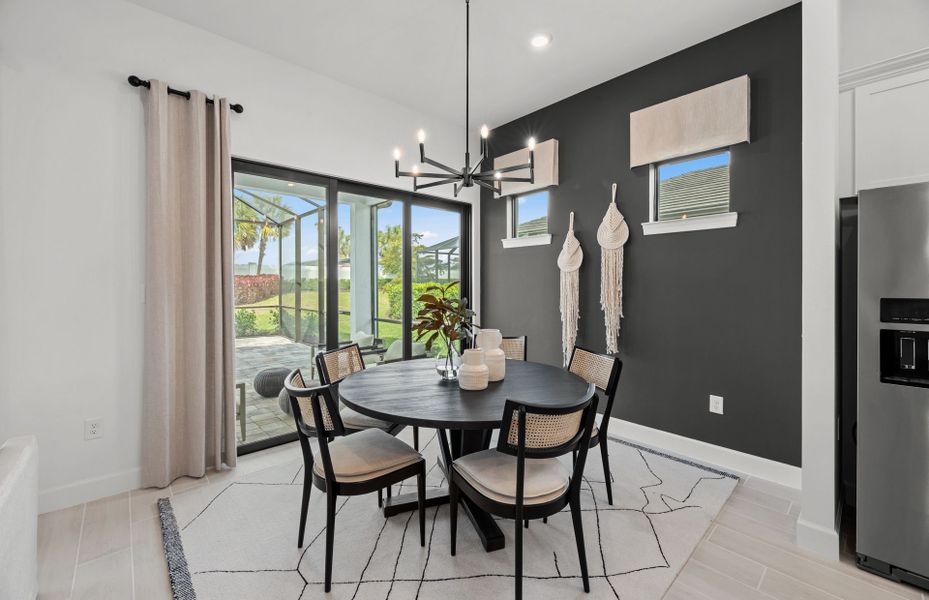 Representative furnished interior of a home built from the Prosperity by DiVosta in BeachWalk by Manasota Key, Englewood (Image 13).