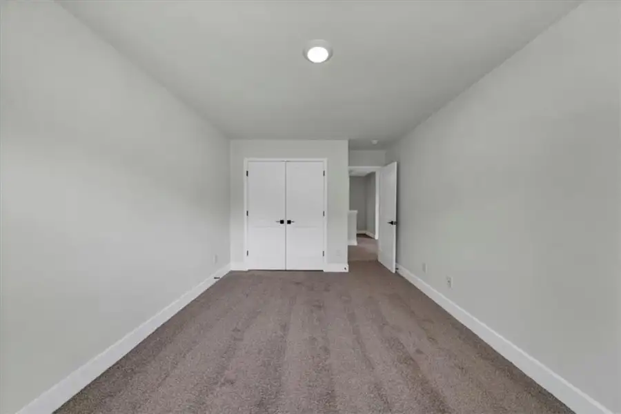 Spacious, unfurnished interior of a new home in Canterbury Villas, Carrollton (Image 24).