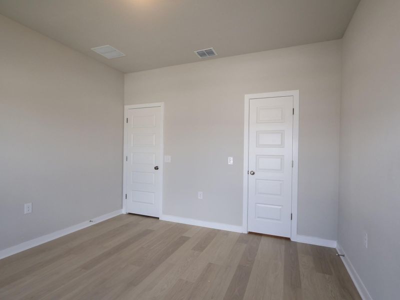 Spacious, unfurnished interior of a new home in Marble Creek Crossing, Austin (Image 8).
