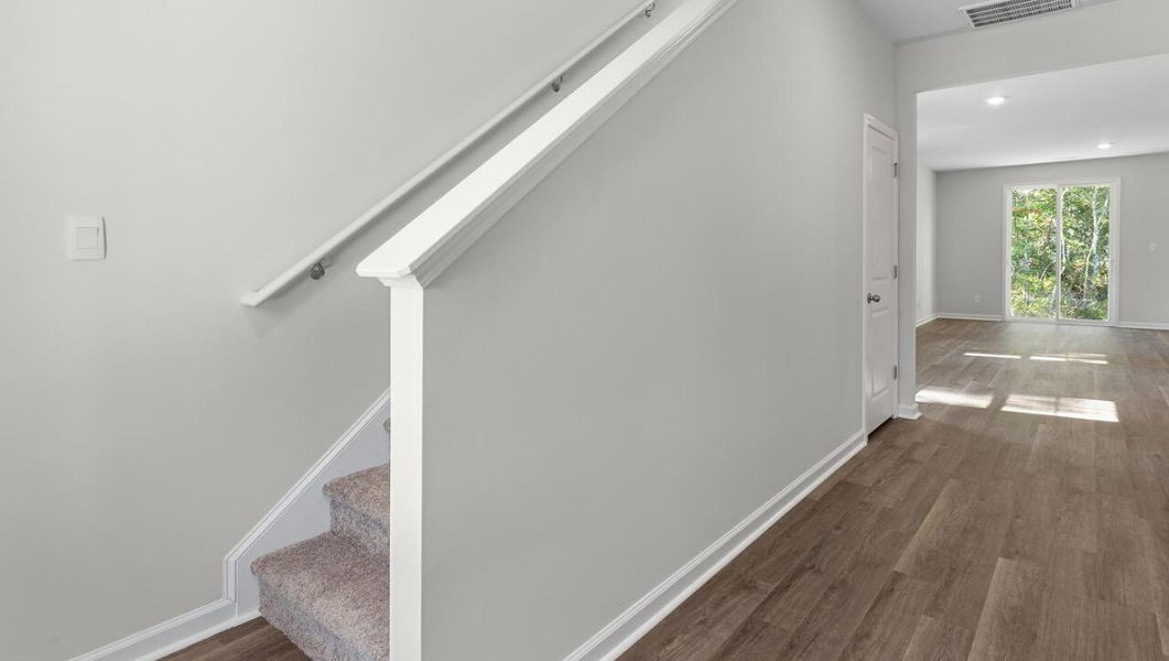 Representative unfurnished interior of a home built from the WOODSTOCK by D.R. Horton in Surfside Landing, Hubert (Image 22).