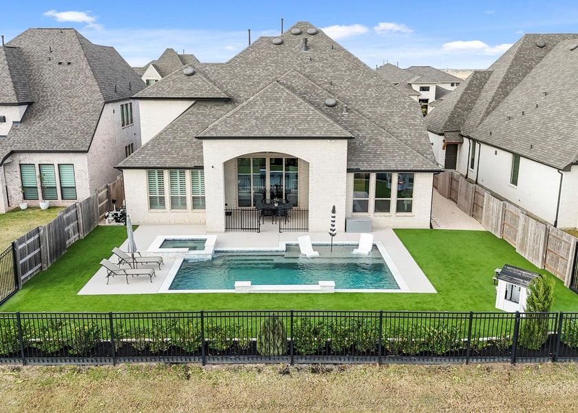 Imagine the amount of family time you’ll spend eating meals under the covered patio, swimming and sun bathing by the pool or relaxing in the heated spa. You will love entertaining your friends and family in this yard! Imagine the amount of family time you’ll spend eating meals under the covered patio, swimming and sun bathing by the pool or relaxing in the heated spa. You will love entertaining your friends and family in this yard!
