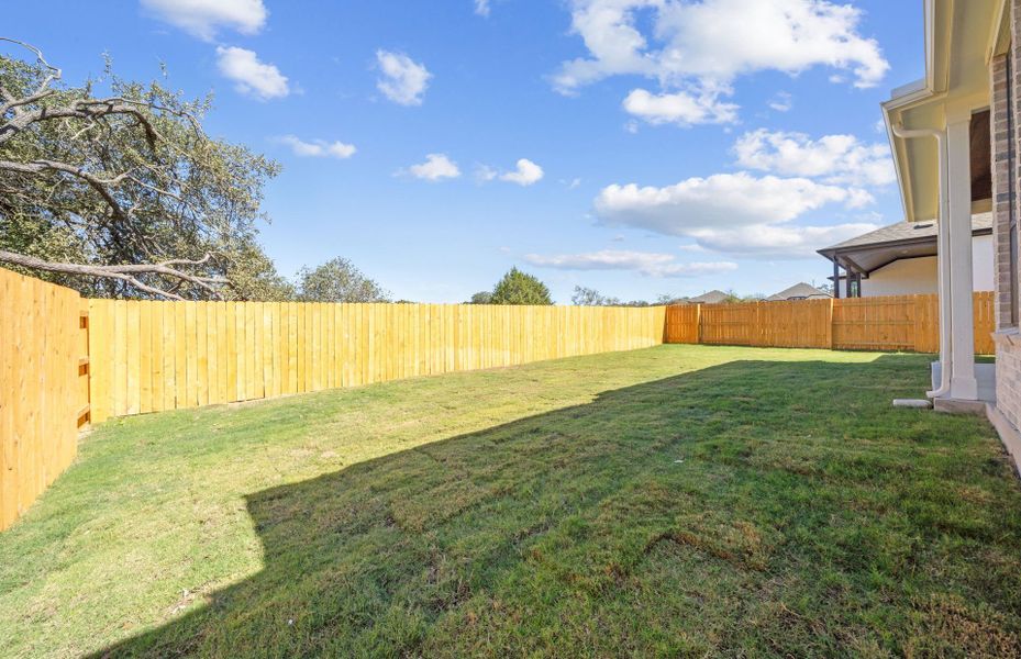 Exterior details and patio area of a home in 6 Creeks, Kyle (Image 21).