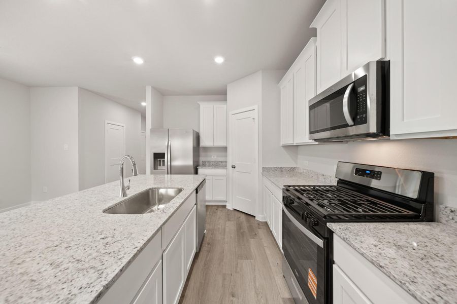 Furnished interior view inside a new home in Lexington Heights, Willis (Image 5). Furnished interior view inside a new home in Lexington Heights, Willis (Image 5).