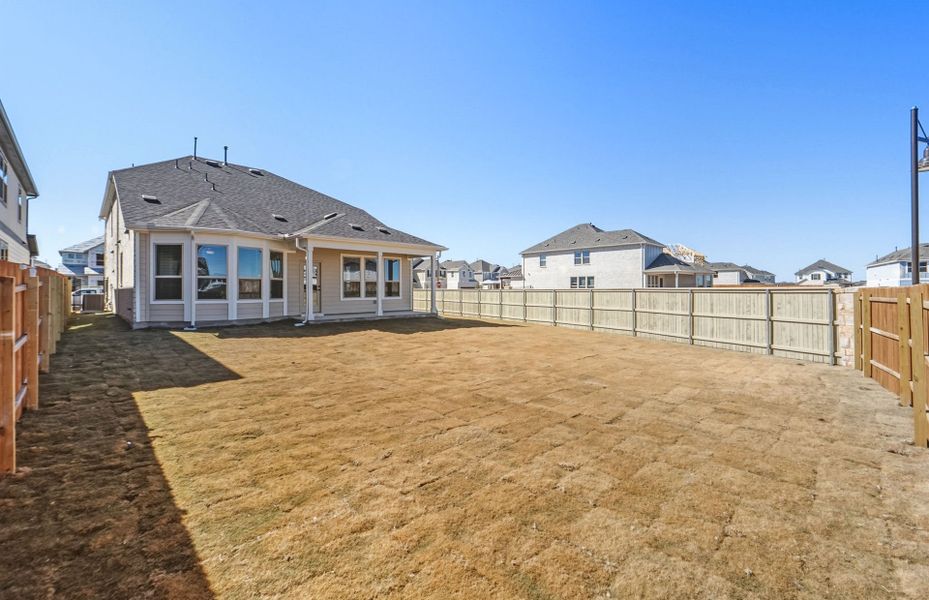 Exterior details and patio area of a home in Santa Rita Ranch, Liberty Hill (Image 3).