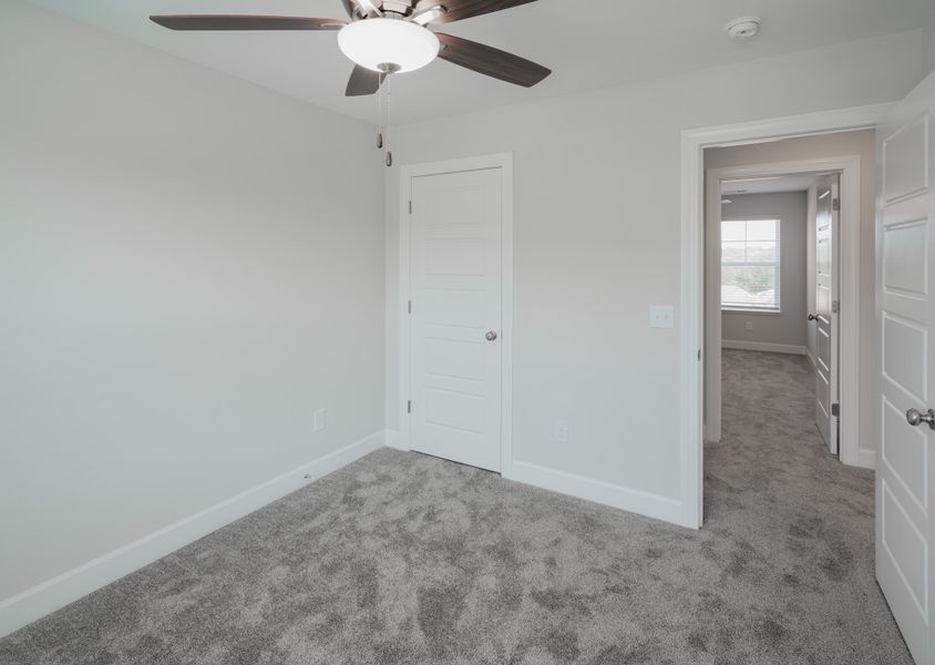 Representative unfurnished interior of a home built from the The Holland by Cothran Homes in Holly Ridge, Greenville (Image 38).