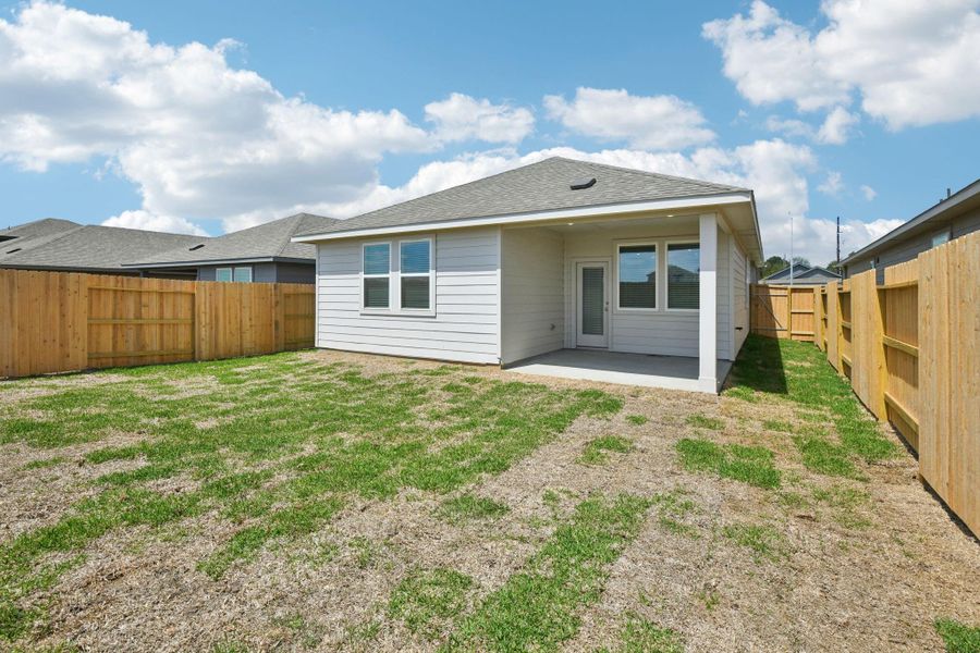Exterior details and patio area of a home in Sanford Farms - Traditional Series, Waller (Image 27).