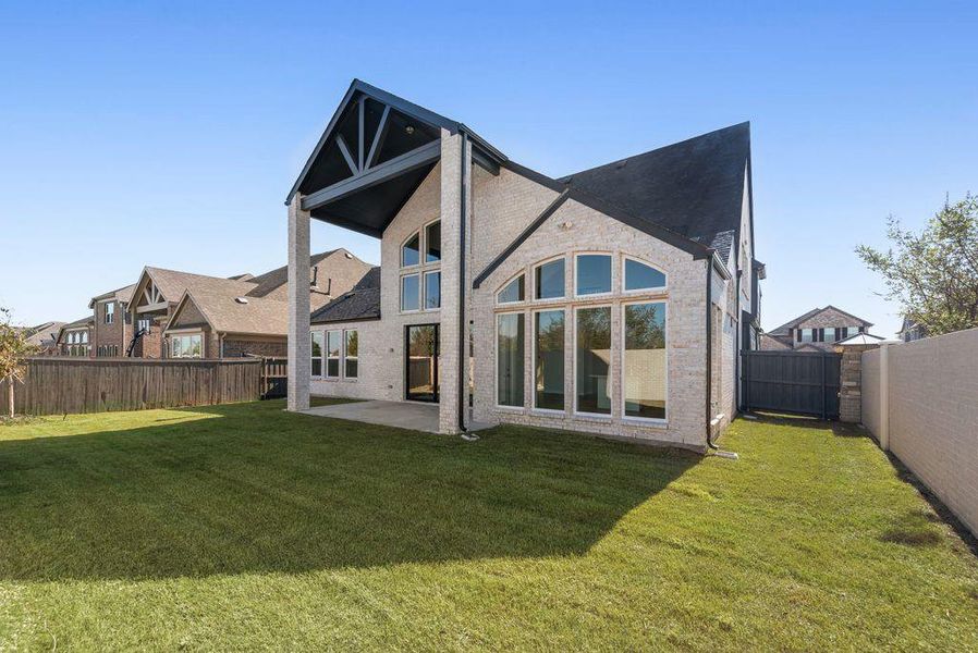 Exterior details and patio area of a home in Prairie Ridge, Venus (Image 3).