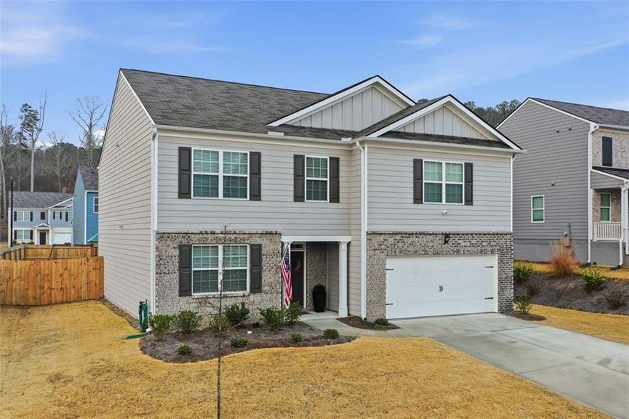 Front exterior of a new home in , Dallas, GA, highlighting curb appeal (Image 24).