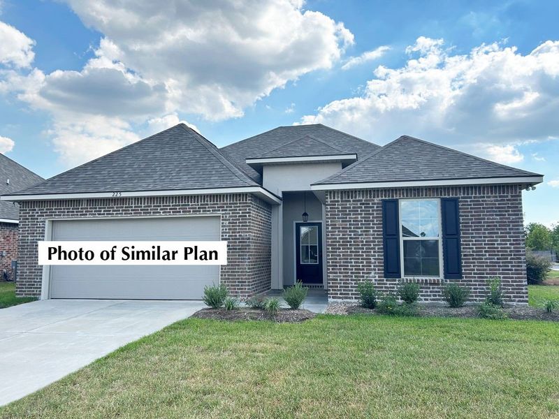 Front exterior of a new home in The Bluffs at Lafayette, Freeport, FL, highlighting curb appeal (Image 2).