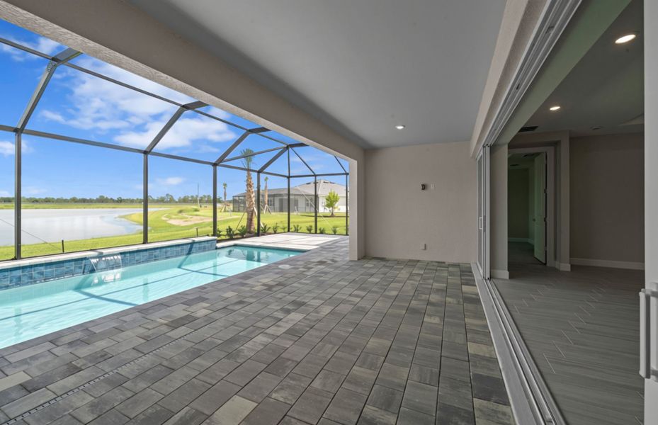 Exterior details and patio area of a home in Del Webb Oak Creek, North Fort Myers (Image 3).