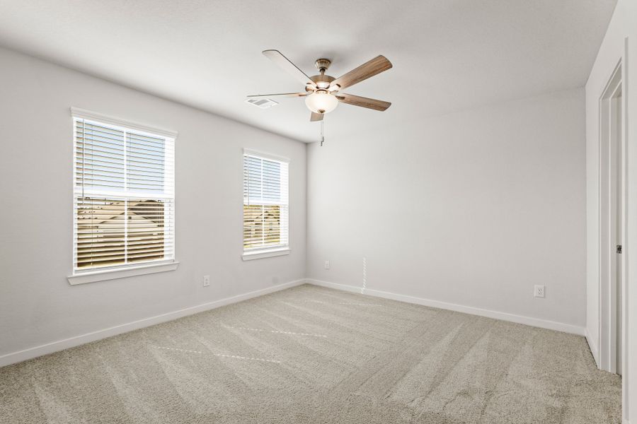 A ceiling fan in a room.