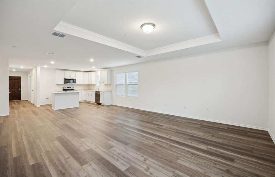 Airy gathering room showcases open concept floorplan Airy gathering room showcases open concept floorplan