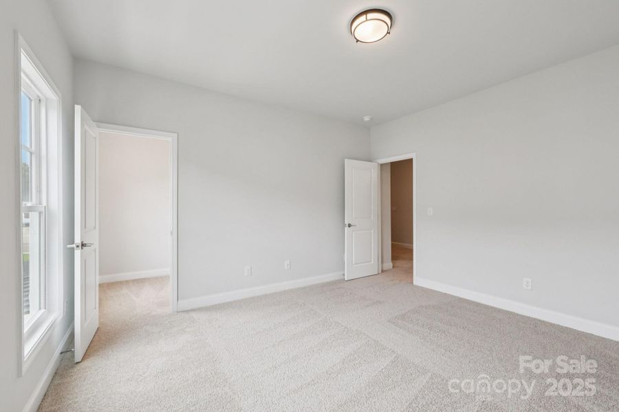 Spacious, unfurnished interior of a new home in Walk23, Huntersville (Image 38).