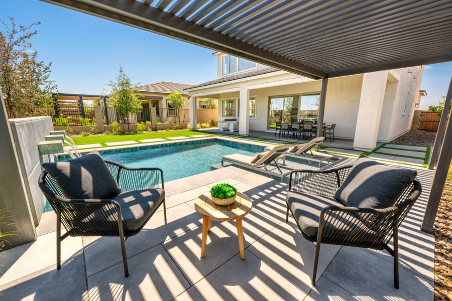 Representative exterior details of a home built from the Willow Plan 40-9 by Tri Pointe Homes in Waterston Central, Gilbert (Image 4).