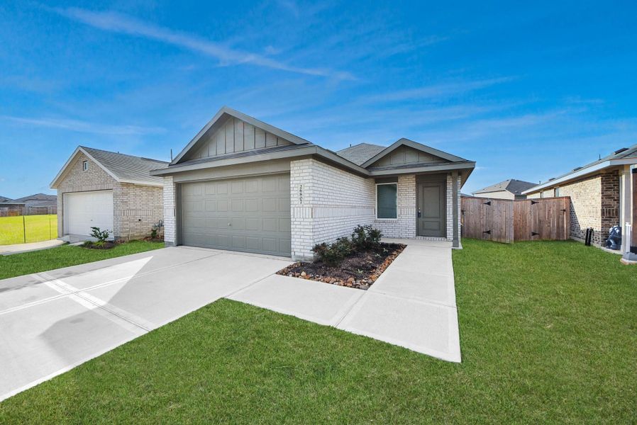 Front exterior of a new home in , Katy, TX, highlighting curb appeal (Image 2). Front exterior of a new home in , Katy, TX, highlighting curb appeal (Image 2).
