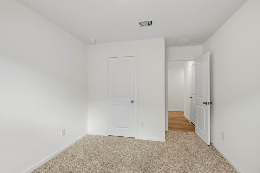 Spacious, unfurnished interior of a new home in New Waverly Station, New Waverly (Image 21). Spacious, unfurnished interior of a new home in New Waverly Station, New Waverly (Image 21).