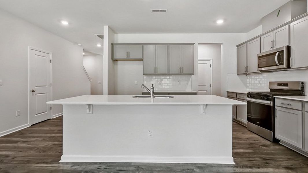 Representative furnished interior of a home built from the DANIEL by D.R. Horton in The Townes Park, Apex (Image 5). Representative furnished interior of a home built from the DANIEL by D.R. Horton in The Townes Park, Apex (Image 5).