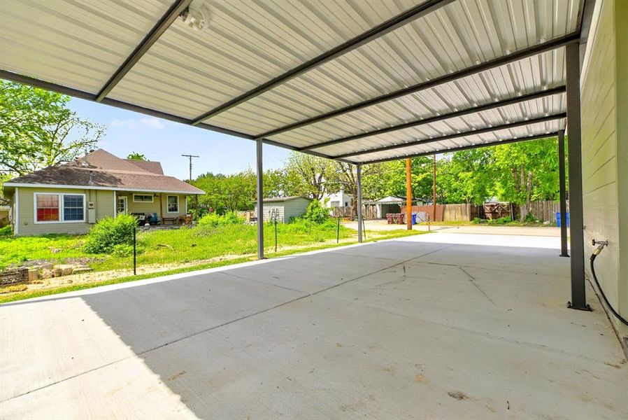 View of patio with a carport View of patio with a carport