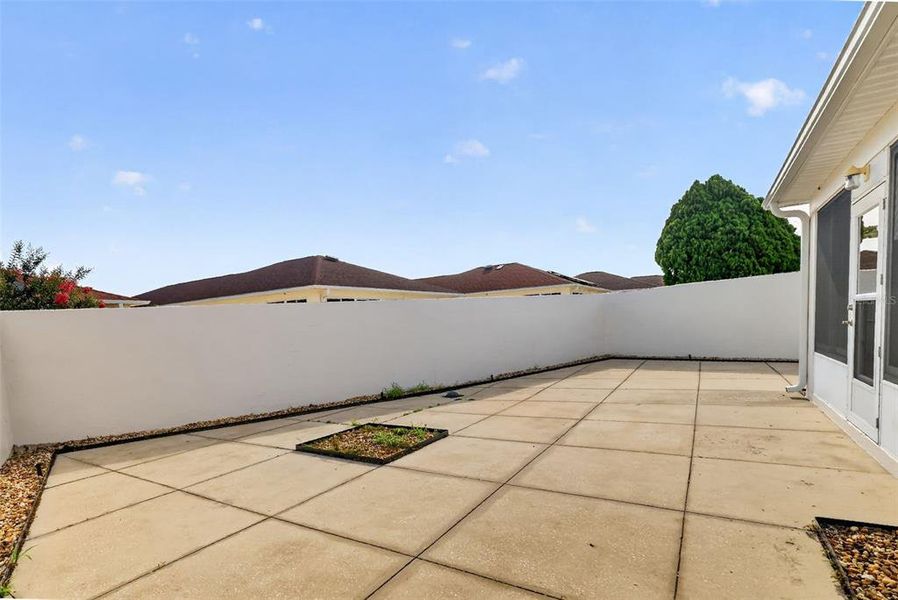 Exterior details and patio area of a home in , The Villages (Image 26).