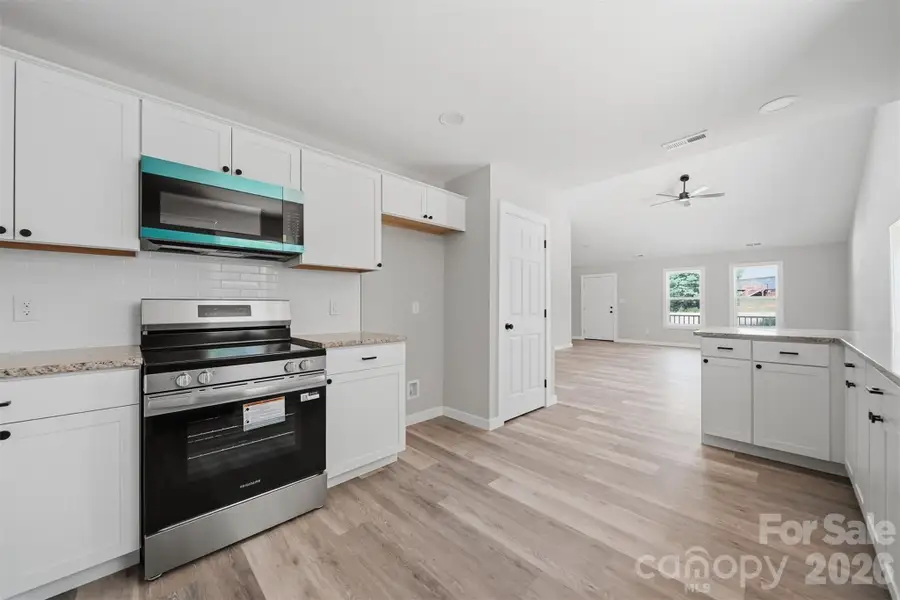 Furnished interior view inside a new home in , Conover (Image 9).