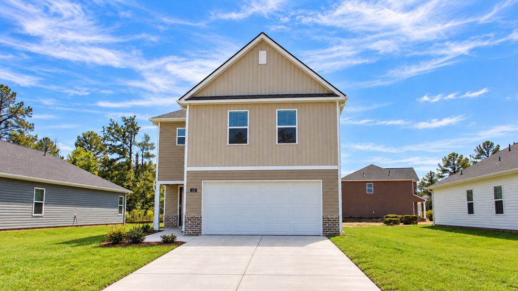 Front exterior of a new home in Evergreen Landing, Rossville, GA, highlighting curb appeal (Image 2). Front exterior of a new home in Evergreen Landing, Rossville, GA, highlighting curb appeal (Image 2).