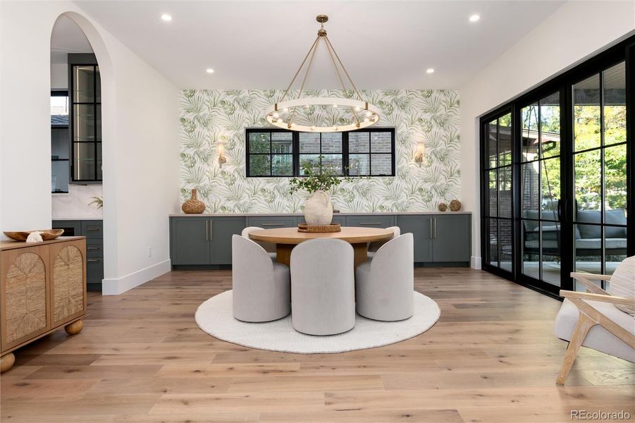 Dining room with custom cabinets, wall paper Dining room with custom cabinets, wall paper