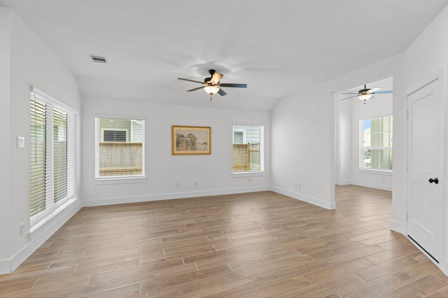 The living area has an abundance of natural light throughout creating a bright and inviting atmosphere!
