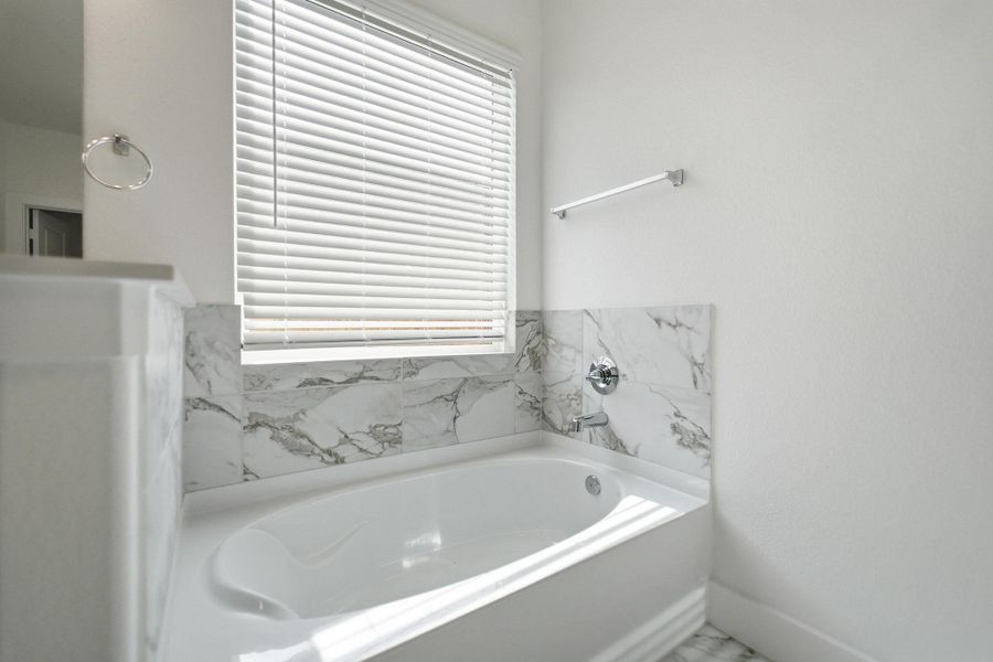 Furnished interior view inside a new home in Sunterra Lakes, Brookshire (Image 8).