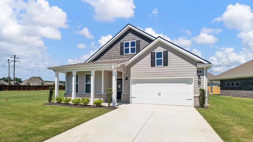 Front exterior of a new home in Shiloh Springs, Jackson, TN, highlighting curb appeal (Image 2). Front exterior of a new home in Shiloh Springs, Jackson, TN, highlighting curb appeal (Image 2).