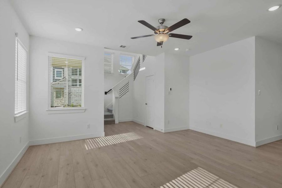 Representative unfurnished interior of a home built from the Riverdale by Chesmar Homes in Meridiana Courtyard Collection, Manvel (Image 20).