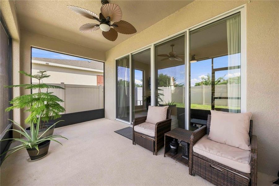 Exterior details and patio area of a home in Seasons at Eden Hills, Lake Alfred (Image 3).