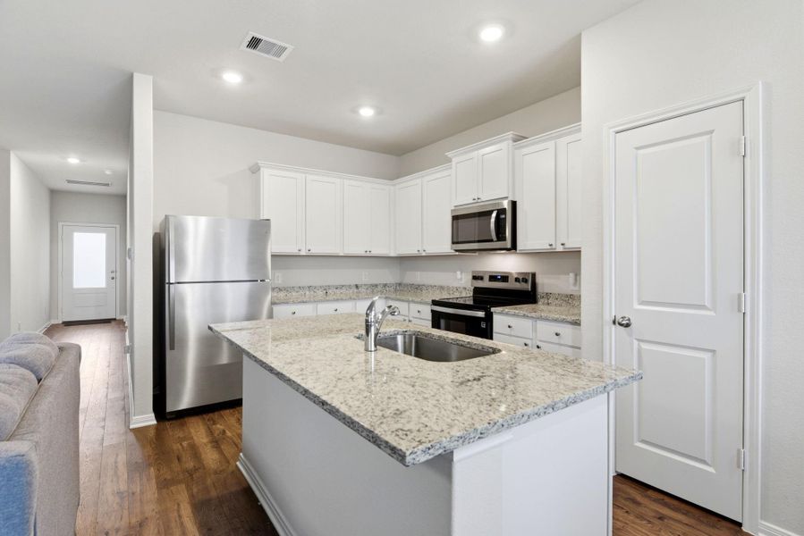 Furnished interior view inside a new home in Vacek Country Meadows, Richmond (Image 18).