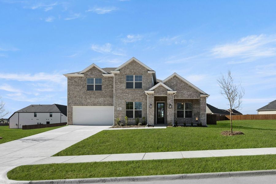 Representative exterior photo of a completed home built from the Cherry by Kindred Homes in Kentsdale Farms, DeSoto, TX (Image 37).