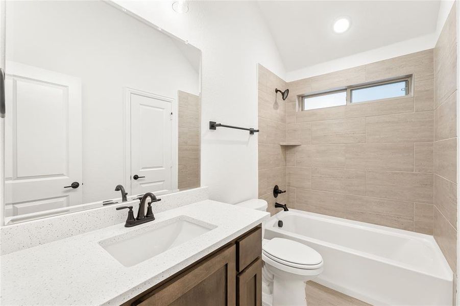 Furnished interior view inside a new home in Stone River Glen 60s, Royse City (Image 15).