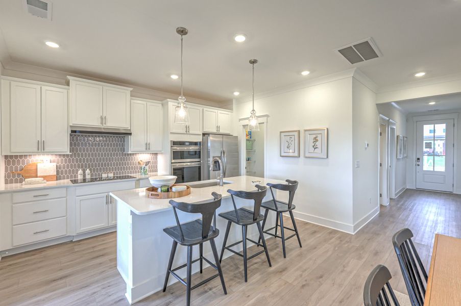 *Photo of example Model Home. Selections and finishes may vary.