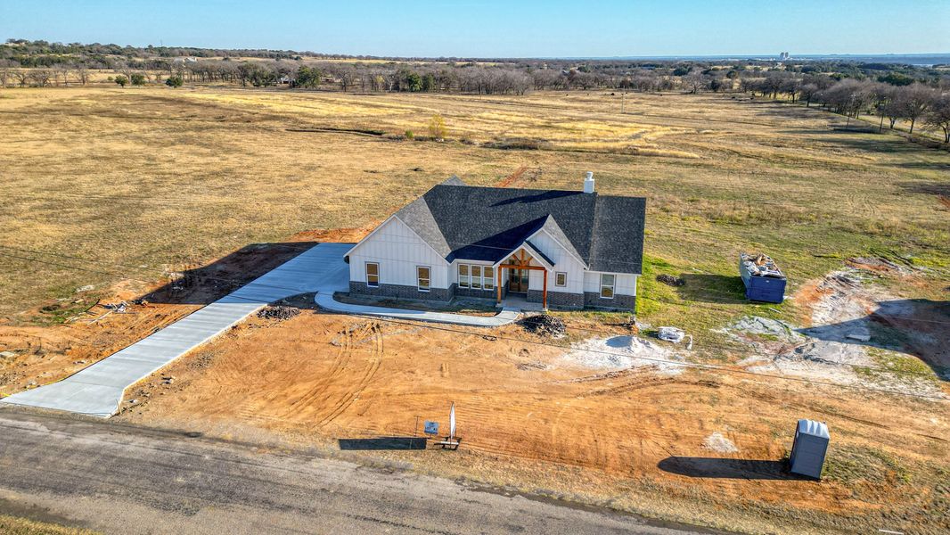 Representative exterior photo of a completed home built from the Jarrett 1 by Zeal Home Builders in Saddle Crest Estates, Weatherford, TX (Image 30).