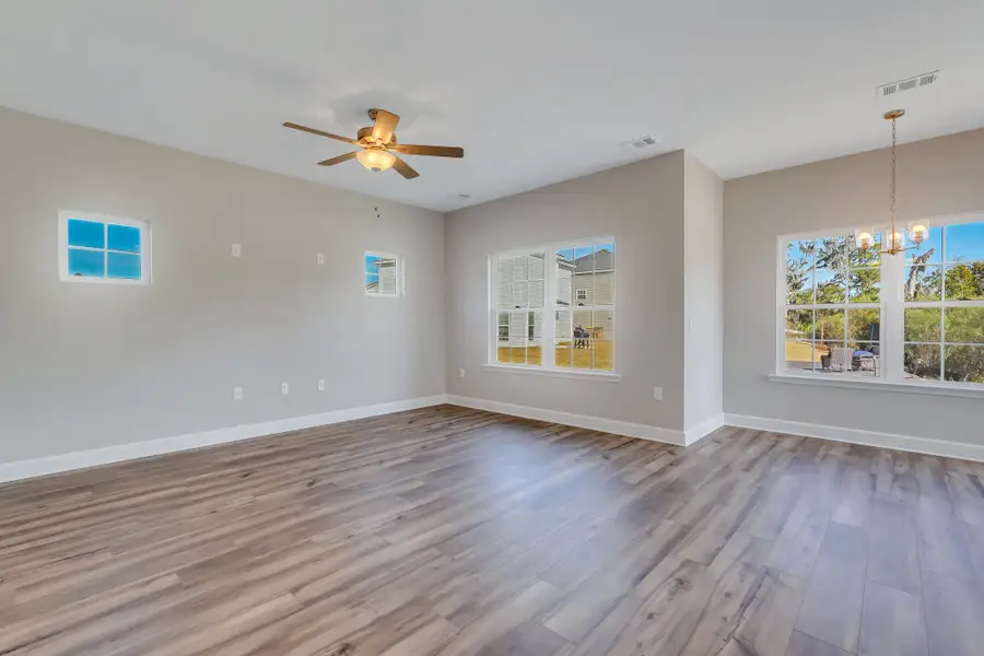 Rose Atoll - Family Room and Breakfast Nook | Ernest Homes