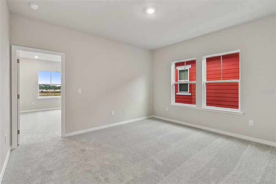 Spacious, unfurnished interior of a new home in Laureate Park at Lake Nona - Garden Series, Orlando (Image 22).