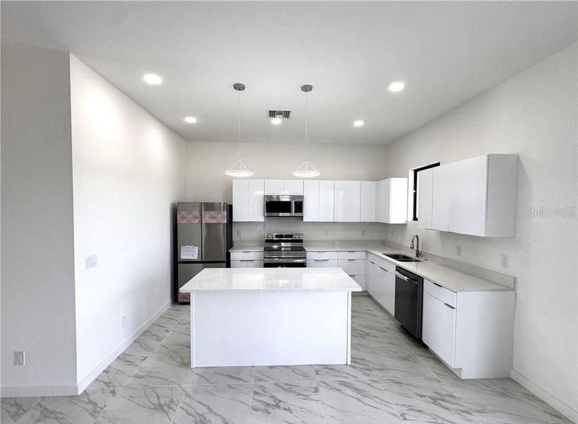 Furnished interior view inside a new home in , Cape Coral (Image 34).