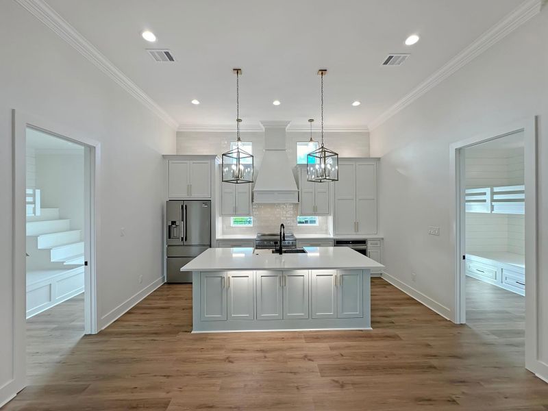 Photos are for illustrative purposes only, showcasing a home built by the same builder. Features such as colors, appliances, fixtures, and finishes are subject to change and may vary from those shown. Please verify details with the builder for the most accurate representation of the final home.