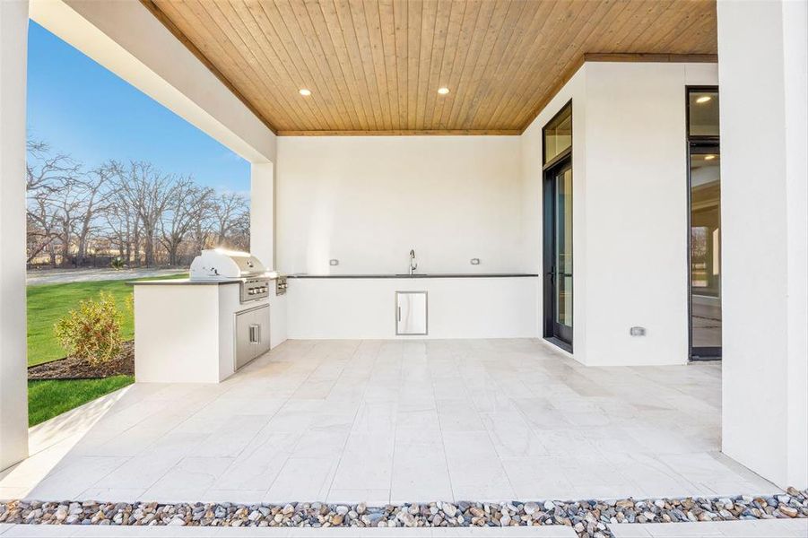 Exterior details and patio area of a home in , Bartonville (Image 24).