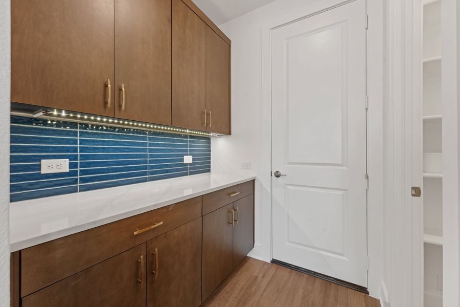 Furnished interior view inside a new home in Union Park, Little Elm (Image 9).