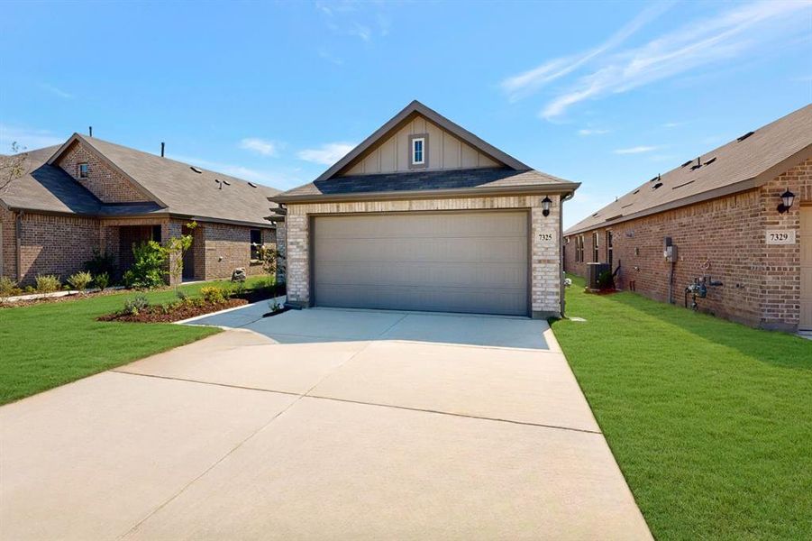 Front exterior of a new home in Meadow Park, Denton, TX, highlighting curb appeal (Image 2).