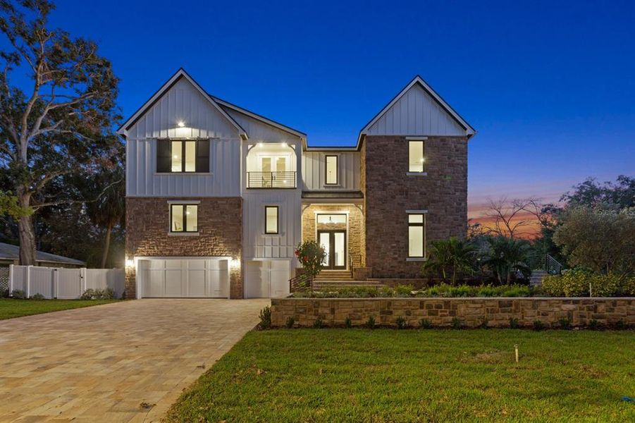Front exterior of a new home in , Tampa, FL, highlighting curb appeal (Image 28). Front exterior of a new home in , Tampa, FL, highlighting curb appeal (Image 28).