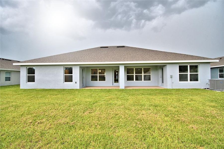 Exterior details and patio area of a home in Cadence Crossing, Auburndale (Image 3). Exterior details and patio area of a home in Cadence Crossing, Auburndale (Image 3).