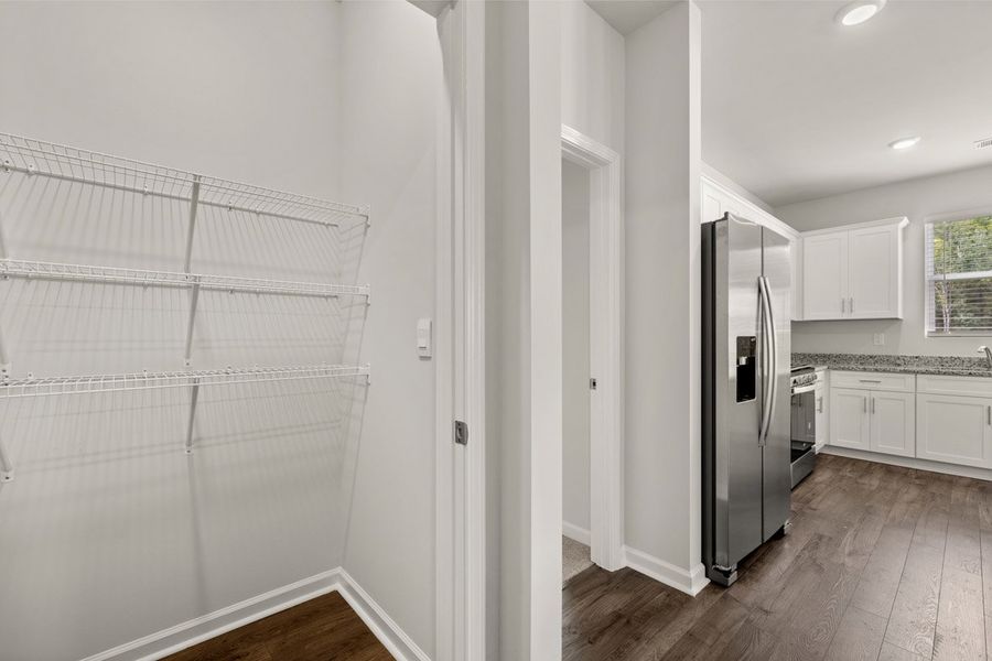 Representative unfurnished interior of a home built from the Mansfield by D.R. Horton in Southwind Village, Evans (Image 18).