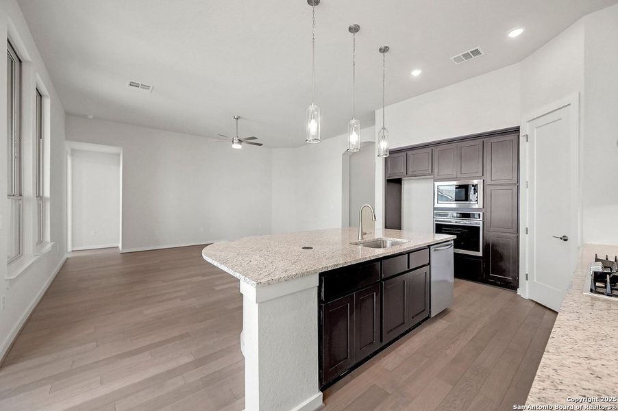 Furnished interior view inside a new home in VIDA, San Antonio (Image 7).