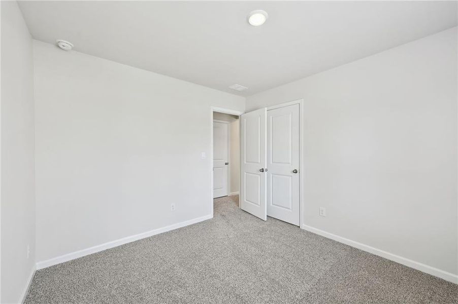 Spacious, unfurnished interior of a new home in Hawthorne Station, College Park (Image 37).