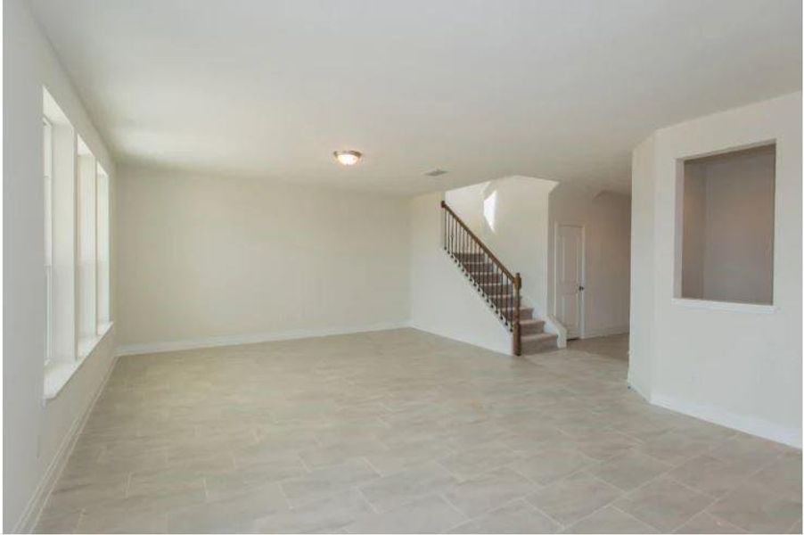 Photo of Pulte home with same floor plan, not of actual home listed.