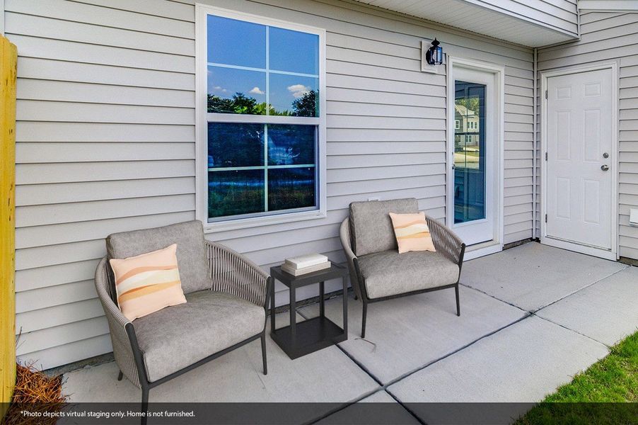 Exterior details and patio area of a home in Padgett Commons, Hopkins (Image 3).